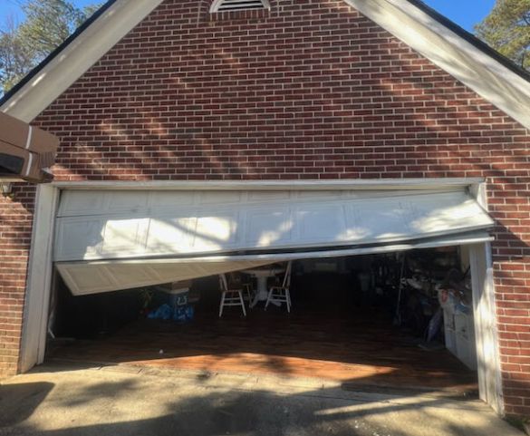 Damage OFF Track Garage Door